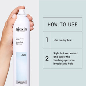 NIOXIN Density Defend Strong Hold Hairspray 372g in a bathroom setting