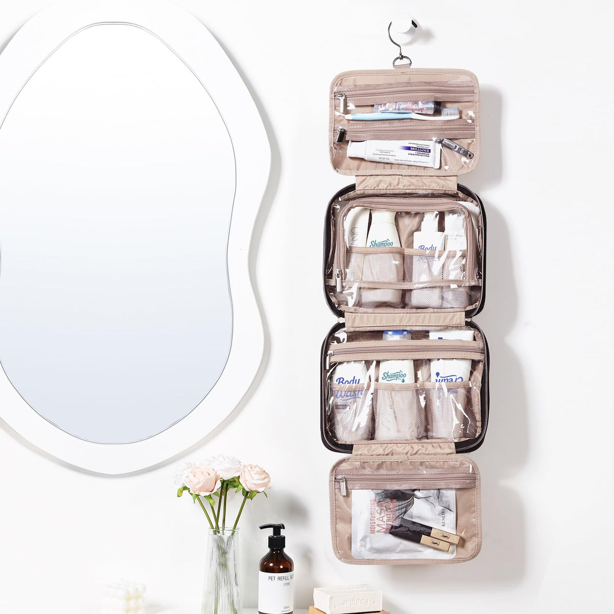 NISHEL Travel Toiletry Bag hanging from a hook