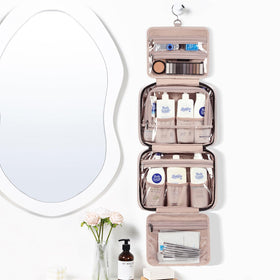 NISHEL Travel Toiletry Bag hanging from a hook