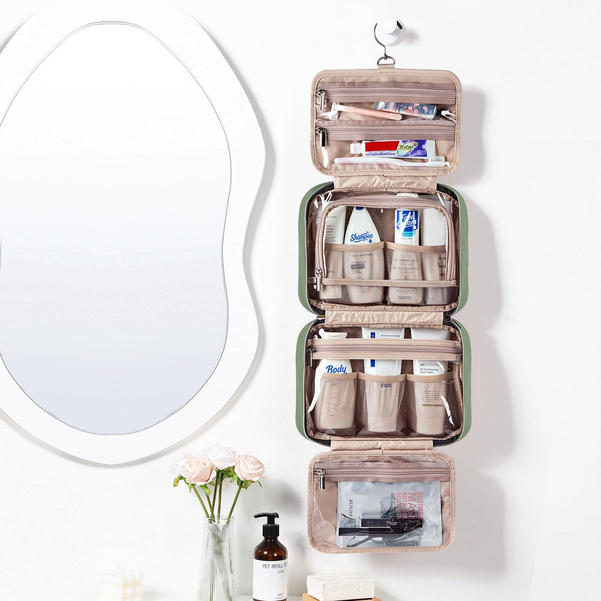 NISHEL Travel Toiletry Bag hanging from a hook