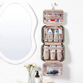 NISHEL Travel Toiletry Bag hanging from a hook