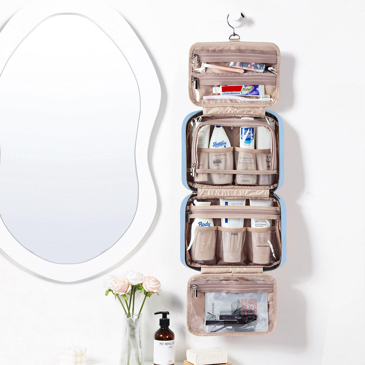 NISHEL Travel Toiletry Bag hanging with toiletries inside