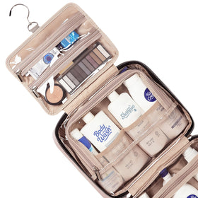 NISHEL Travel Toiletry Bag packed with full-sized toiletries