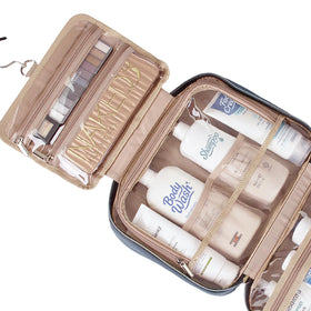 NISHEL Travel Toiletry Bag packed with full-sized toiletries