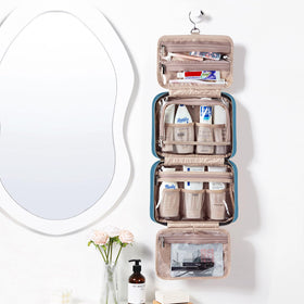 NISHEL Travel Toiletry Bag showing transparent window for visibility