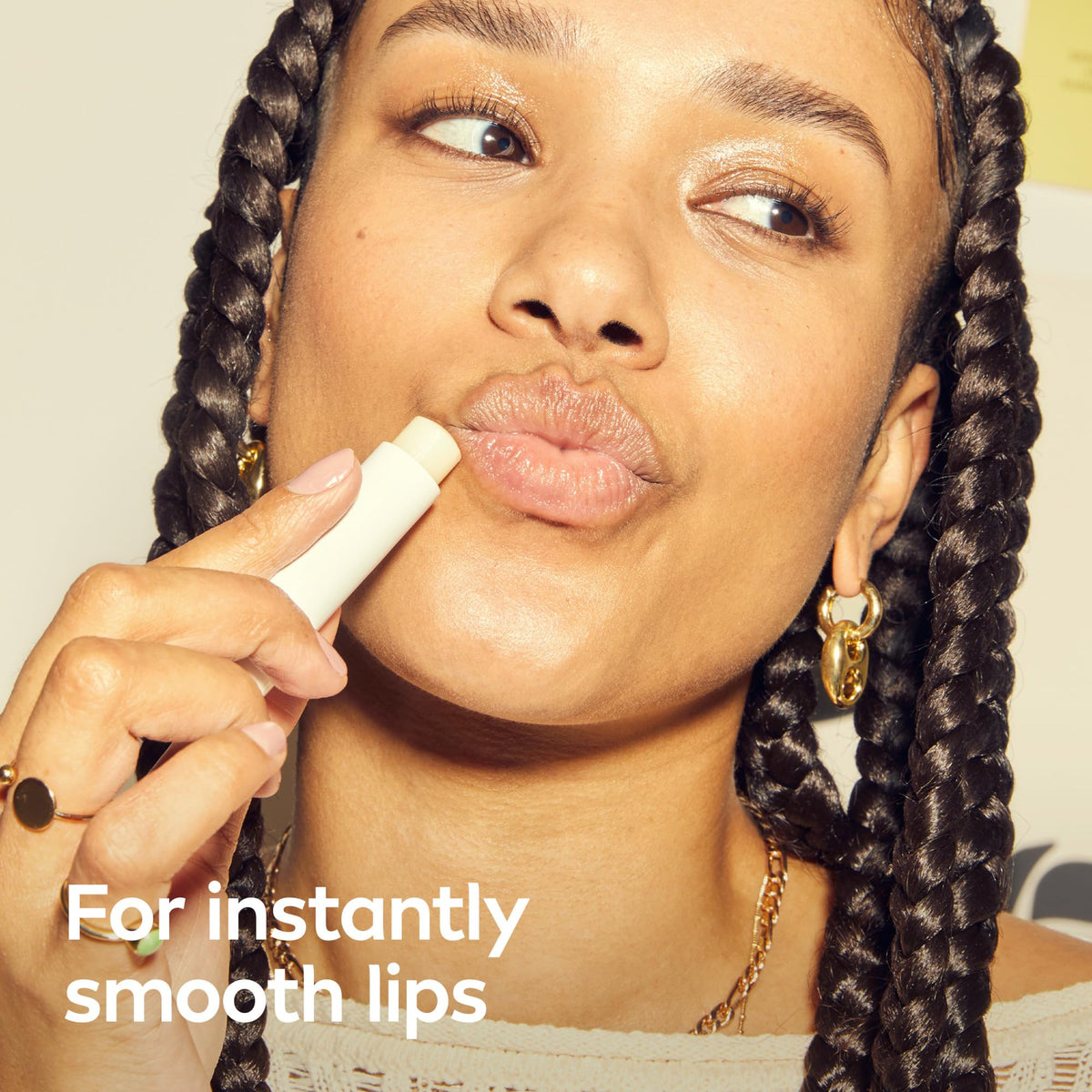 NIVEA Dewy Lip Care with Hyaluronic Acid in hand