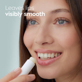 NIVEA Dewy Lip Care with Hyaluronic Acid on a bathroom counter