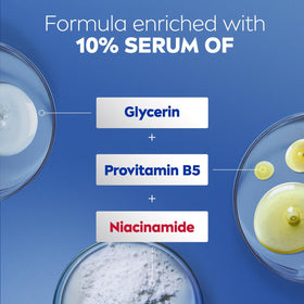 NIVEA Intense Healing Body Lotion in a hand