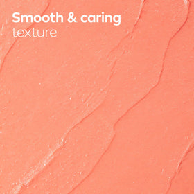 NIVEA Peach Lip Care tinted lip balm in a purse