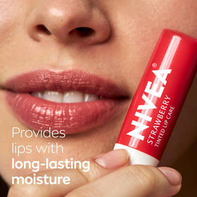 NIVEA Strawberry Lip Care lip balm open with product visible