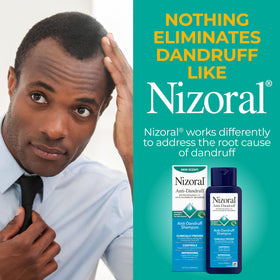 Nizoral Anti-Dandruff Shampoo 14 Fl Oz in a bathroom setting