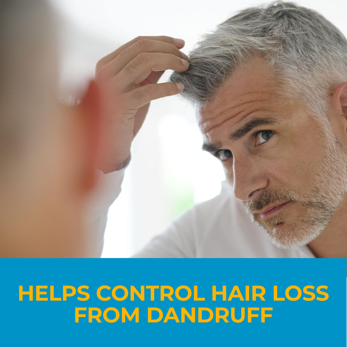 Nizoral Anti-Dandruff Shampoo with water droplets