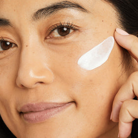 No7 Lift & Luminate Face Cream opened showing texture