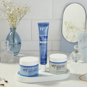 No7 Lift & Luminate Face Cream texture on fingertip