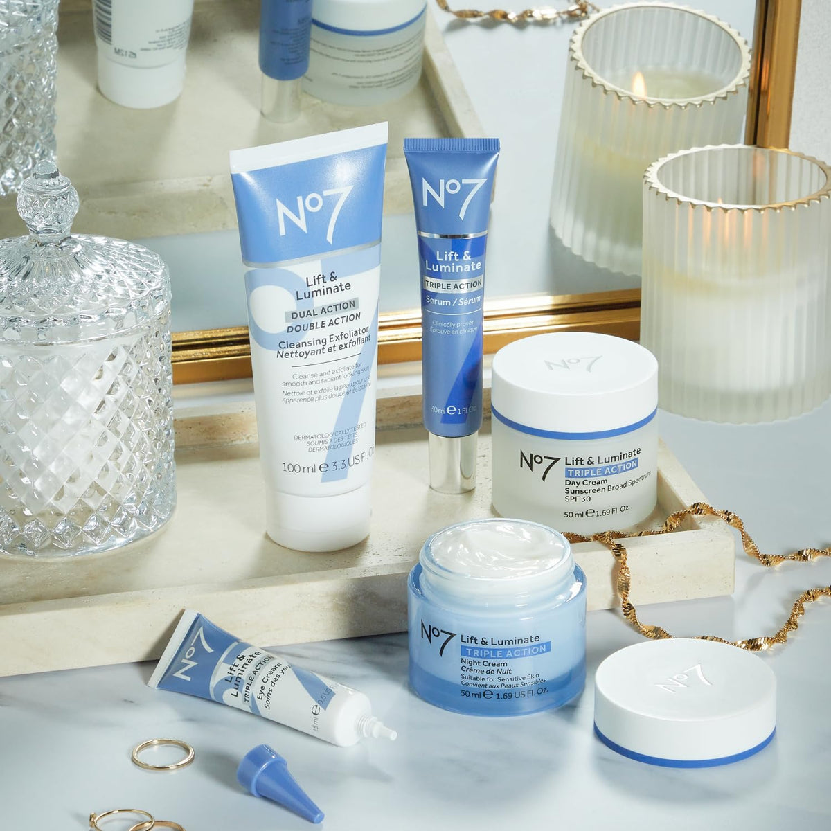 No7 Lift & Luminate skincare products on a marble surface
