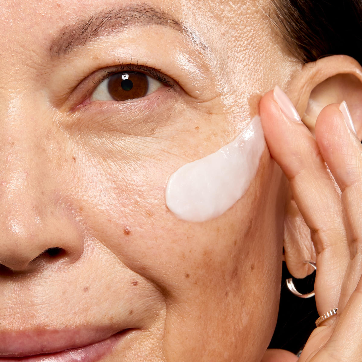 No7 Restore & Renew night cream on a bathroom countertop