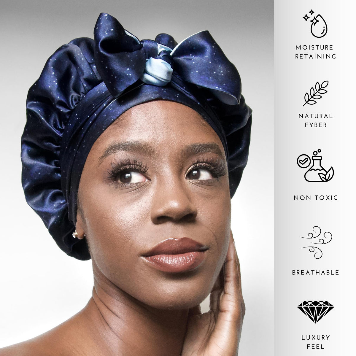 Nochka Fashion silk bonnet displayed on a soft pillow