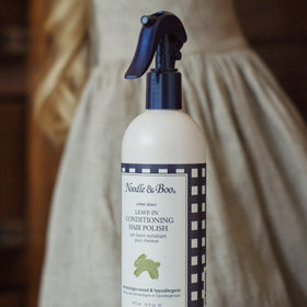 Noodle & Boo Hair Polish Detangler in signature pink and blue packaging