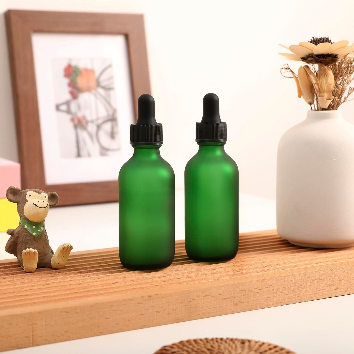 NOOEEISS dropper bottles arranged in a grid pattern