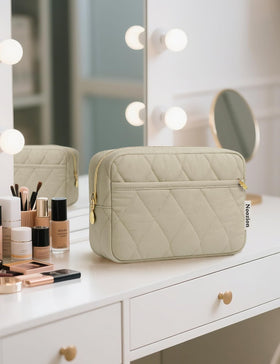 Noozion Makeup Bag open with travel-size toiletries inside