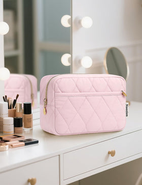 Noozion Makeup Bag showing front zipper pouch with small items