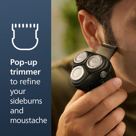 Norelco 3600 Electric Shaver showing self-sharpening blades