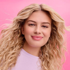 Not Your Mother's Curl Defining Shampoo and Conditioner with tropical background