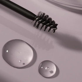 NULASTIN Shape Altering Eyebrow Serum with user applying