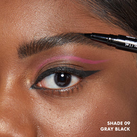 NYX eyebrow tint pen Gray Black displayed on a makeup table