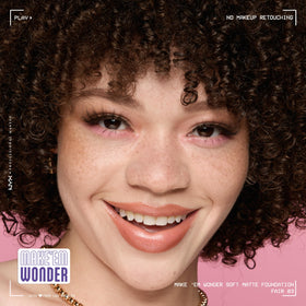 NYX Make 'Em Wonder Liquid Foundation 03 Fair with makeup brush