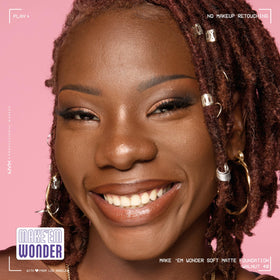 NYX Make 'Em Wonder Liquid Foundation 40 Walnut in a makeup setup