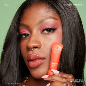 NYX Smushy Matte Lip Balm Soft Sorbet on model's lips