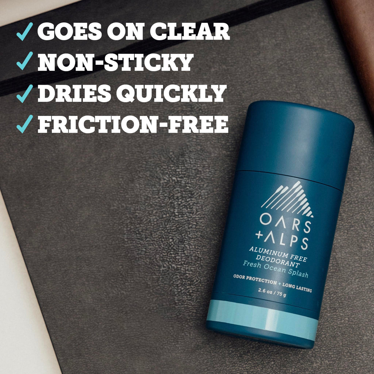 Oars + Alps Men's Deodorant stick in hand