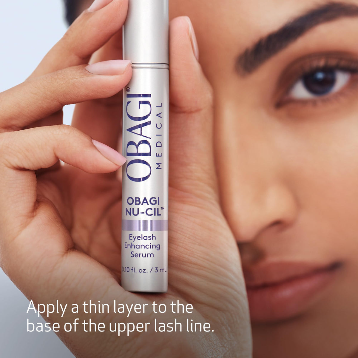 Obagi Medical Nu-Cil Eyelash support Serum with eyelashes background