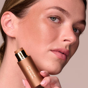Ogee Sculpted Face Stick Amber in a beauty setup