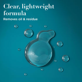 OGX Clarifying Shampoo showing the pump and cap