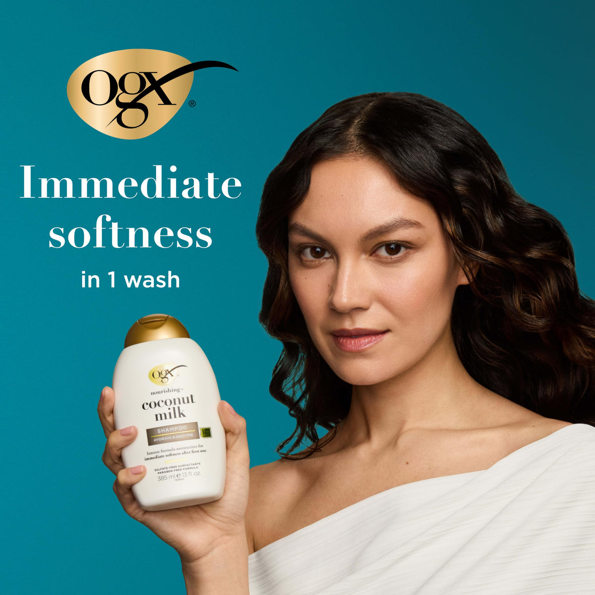 OGX Coconut Milk Shampoo and Conditioner on bathroom shelf