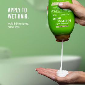 OGX Extra Strength Refreshing Scalp + Teatree Mint Conditioner on bathroom shelf