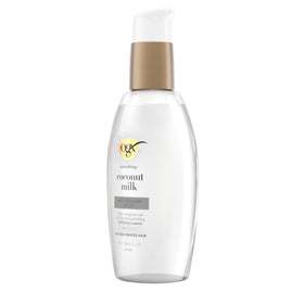 OGX Nourishing Coconut Milk Hair Serum on a bathroom shelf