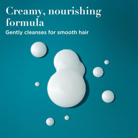 OGX Nourishing + Coconut Milk Shampoo cap close-up