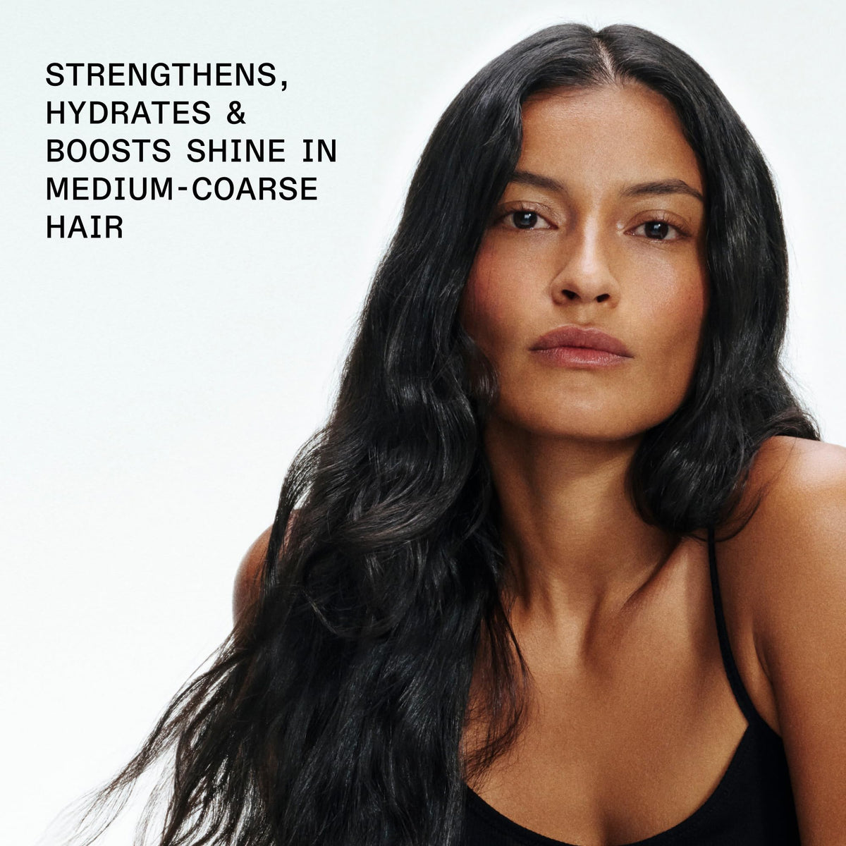 Olaplex N°.4 Bond Maintenance Shampoo lathering in hands