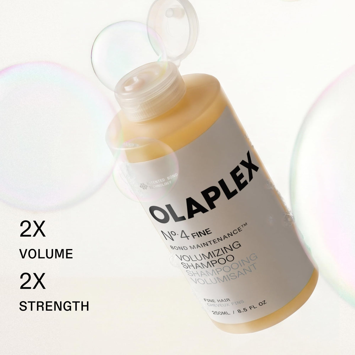 Olaplex N°.4FINE shampoo in a bathroom setting