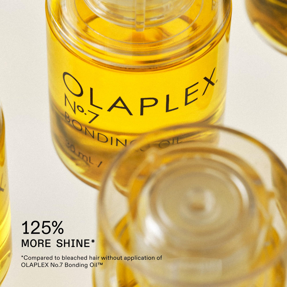 Olaplex N°.7 Bonding Hair Oil with hair styling tools