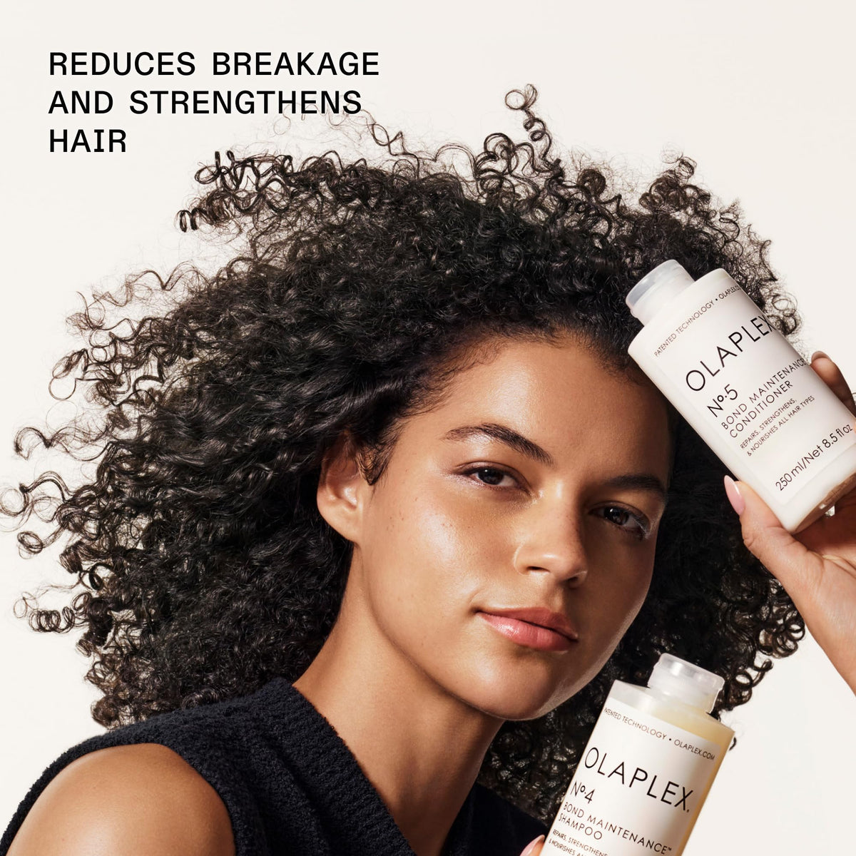 Olaplex shampoo and conditioner in a bathroom setting