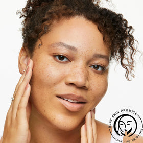 Olay Clarifying Daily Facial Cleanser in bathroom setting