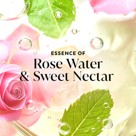 Olay Fresh Radiance Body Wash in a bathroom setting with flowers