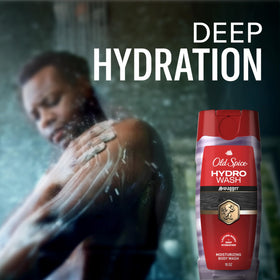 Old Spice body wash lathering on skin in shower