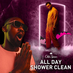 Old Spice Raptorstrike Body Wash with dark berry fruits background