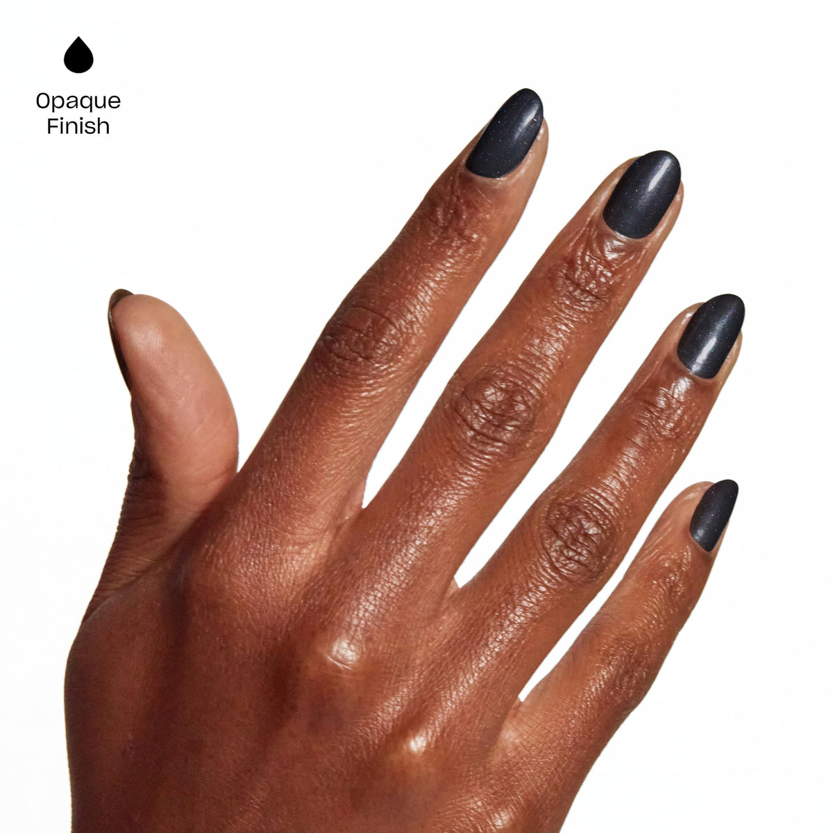 OPI GelColor Opaque Black Pearl nail polish under LED lamp