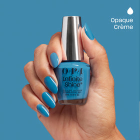 OPI It's In Your Jeans nail polish on a manicure table